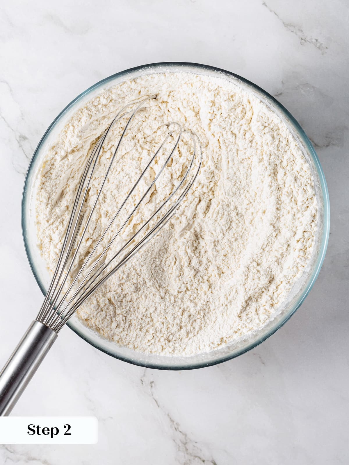 Dry baking ingredients whisked together for sourdough cookie dough.