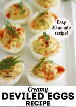Arrangement of creamy deviled eggs topped with paprika and dill. Text overlay reads easy 30 minute recipe.