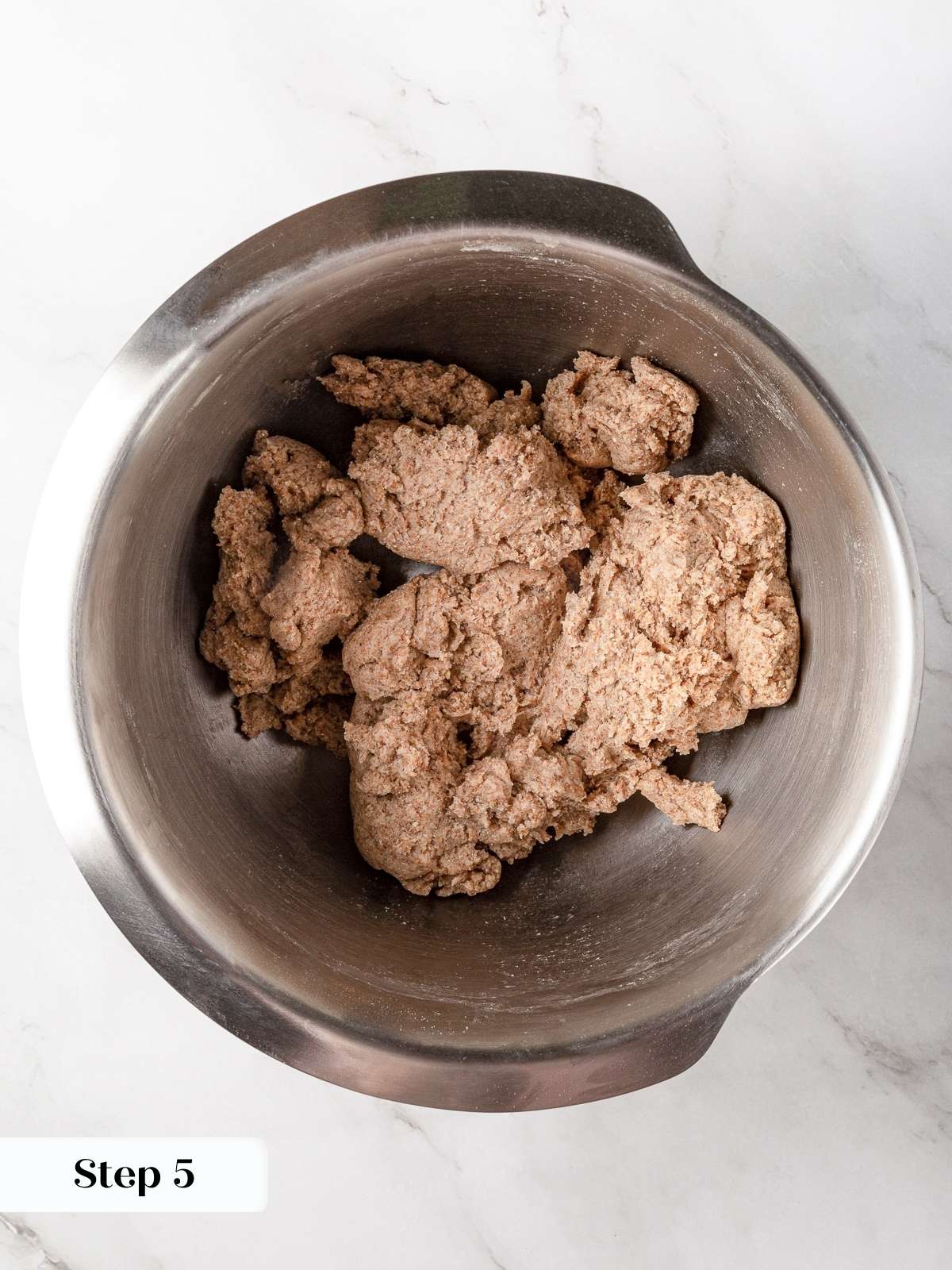 Whole wheat biscuit dough forming after adding buttermilk.