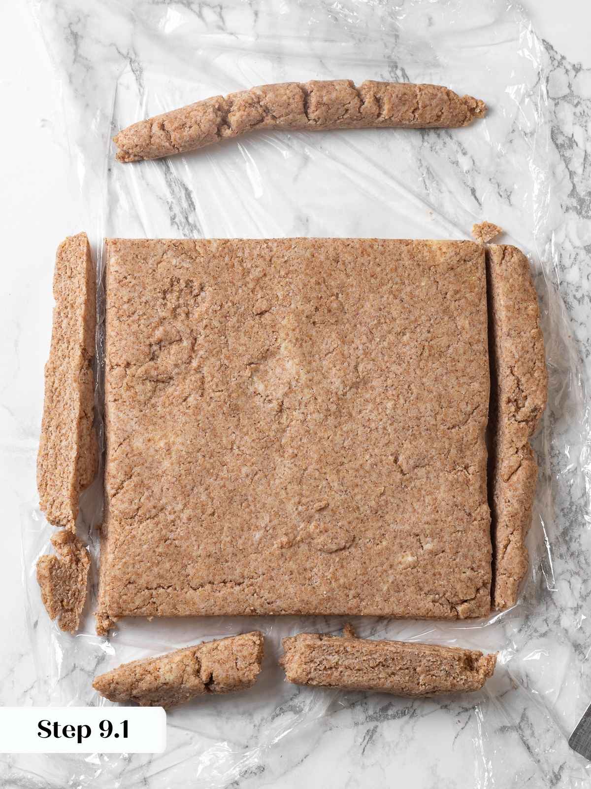 Whole wheat dough squared and edges cut cleanly.