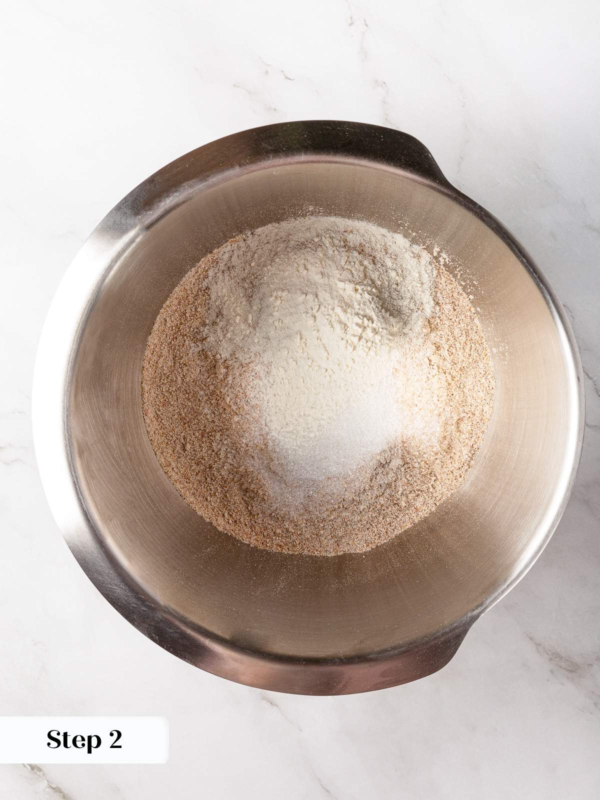 Whole wheat flour, baking powder, sugar, and salt mixed together.