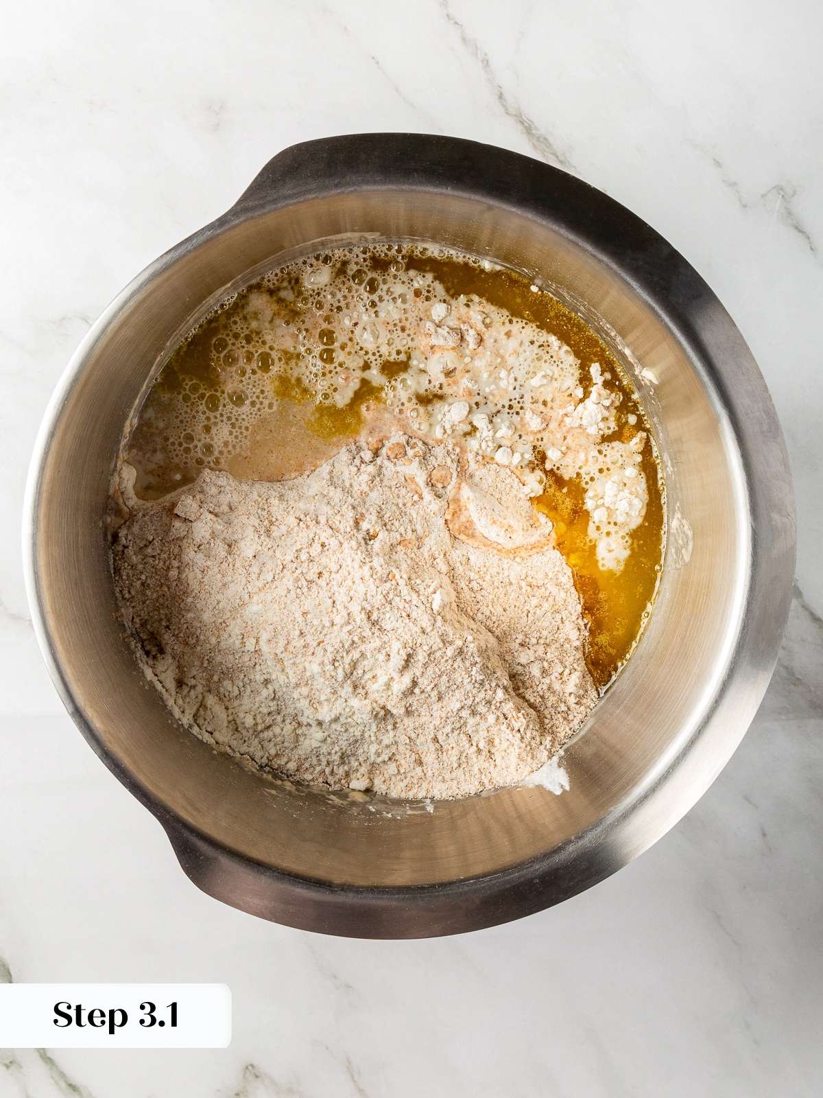 Olive oil, salt, and remaining water added to pita dough.