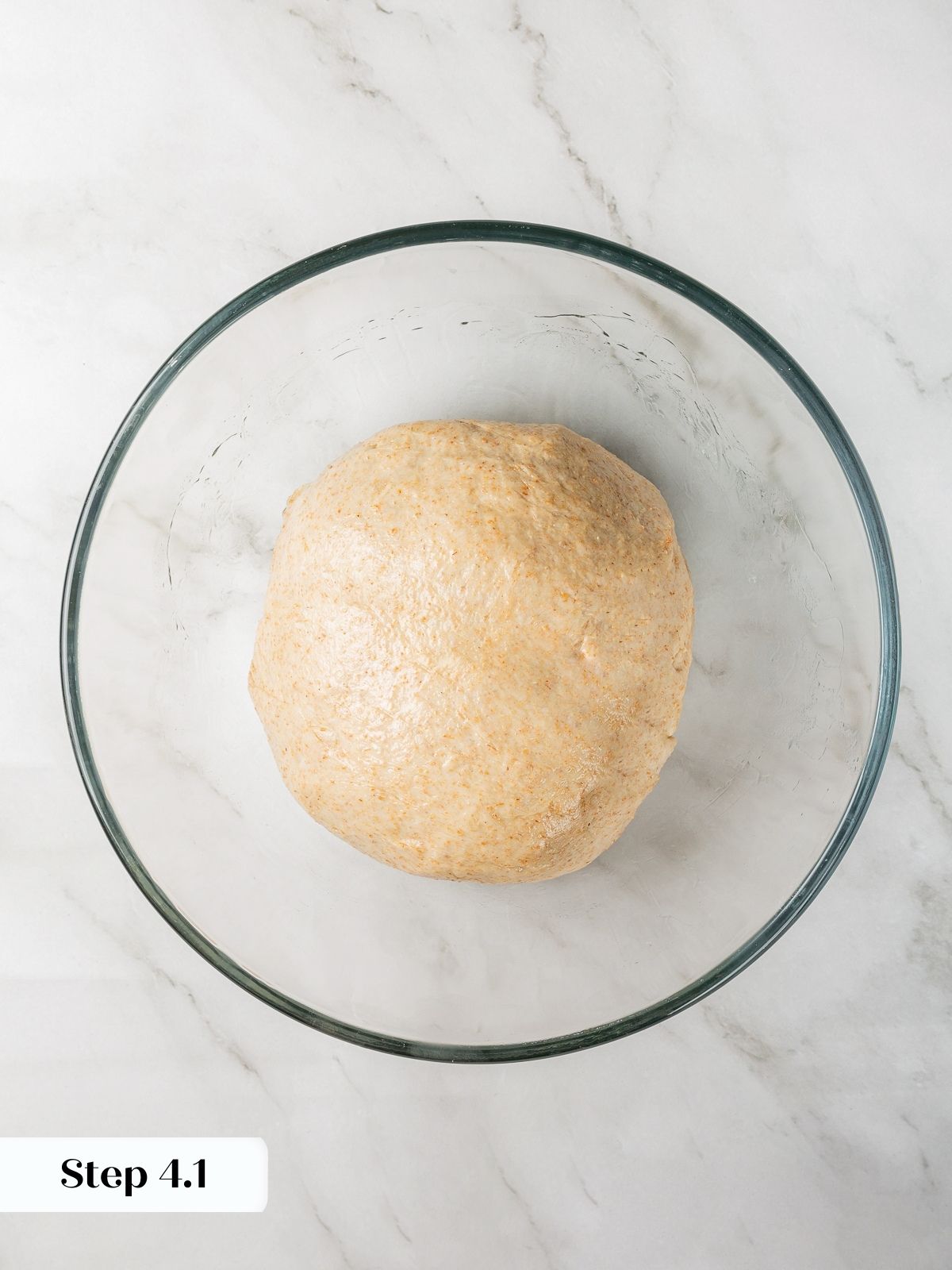 Newly mixed pita dough shaped into ball before rising.