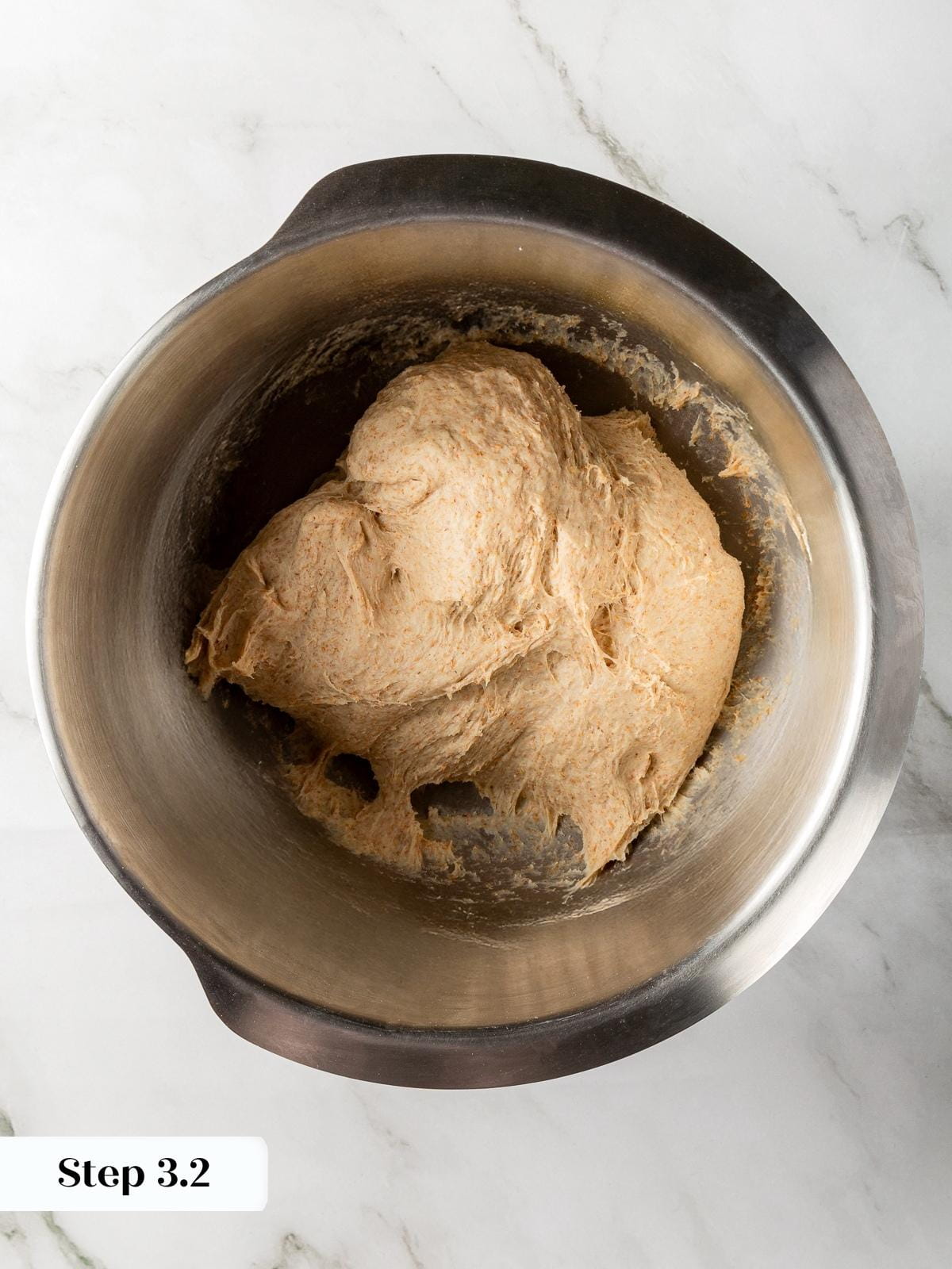 Kneaded pita dough smooth and slightly sticky to touch.