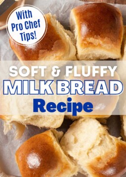 Soft and fluffy milk bread dinner rolls on parchment paper. Text overlay reads recipe with pro chef tips.