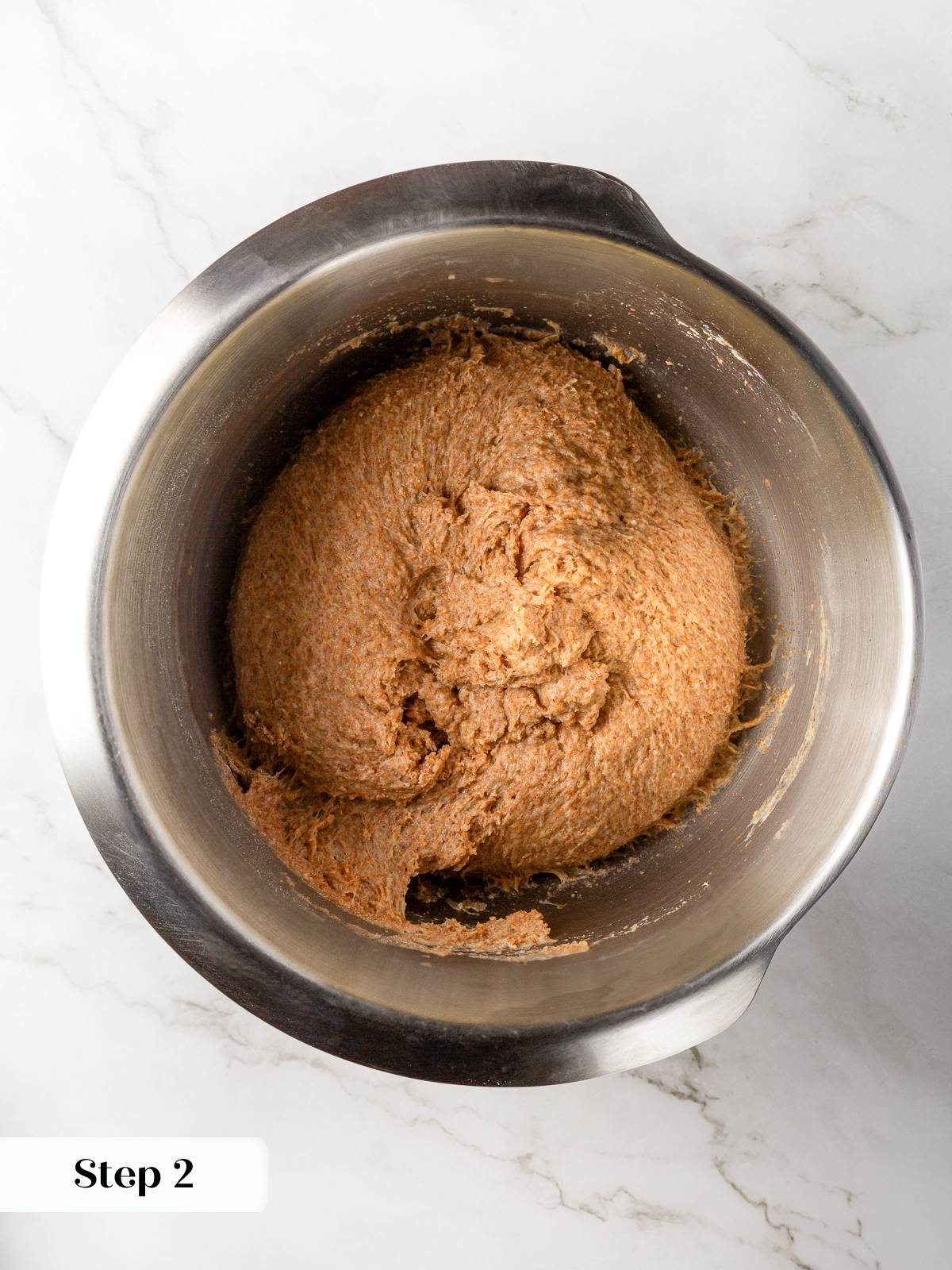 Dough ingredients gathered in bowl ready to mix whole wheat dinner roll dough.