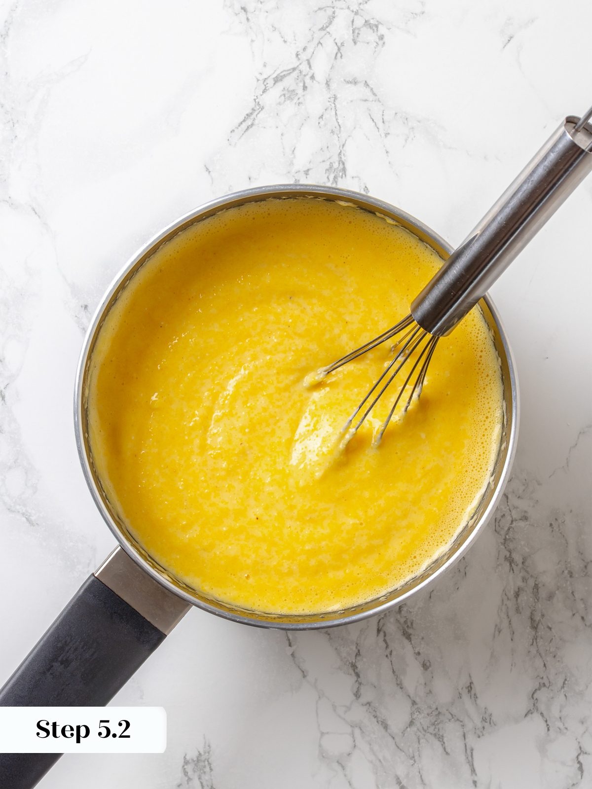 Thick cornmeal batter in saucepan after cooking, smooth and ready for final ingredients.