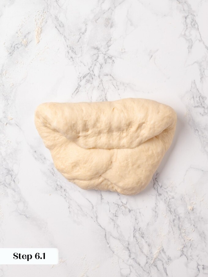 Buttermilk dough showing horizontal seam after folding far side toward the center.