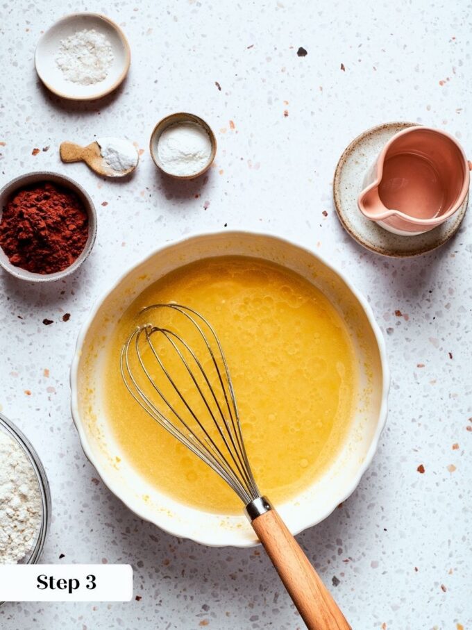 Warm coconut oil whisked into the wet mixture keeps the finished chocolate bread tender and moist.