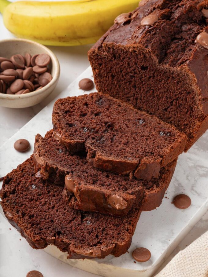 Seen from above, the cut slices highlight the even crumb of gluten free chocolate banana bread.