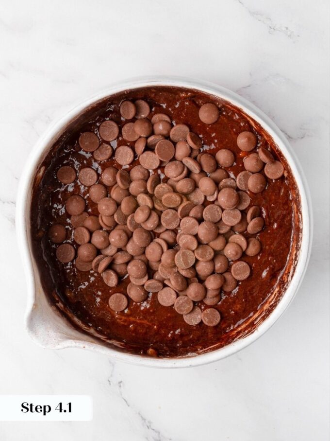Folding in plenty of chips builds pockets of melted chocolate throughout gluten free chocolate banana bread.