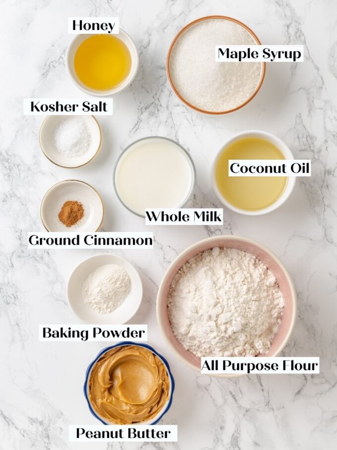 Every component measured before mixing, including the coconut oil that keeps this peanut butter bread moist.