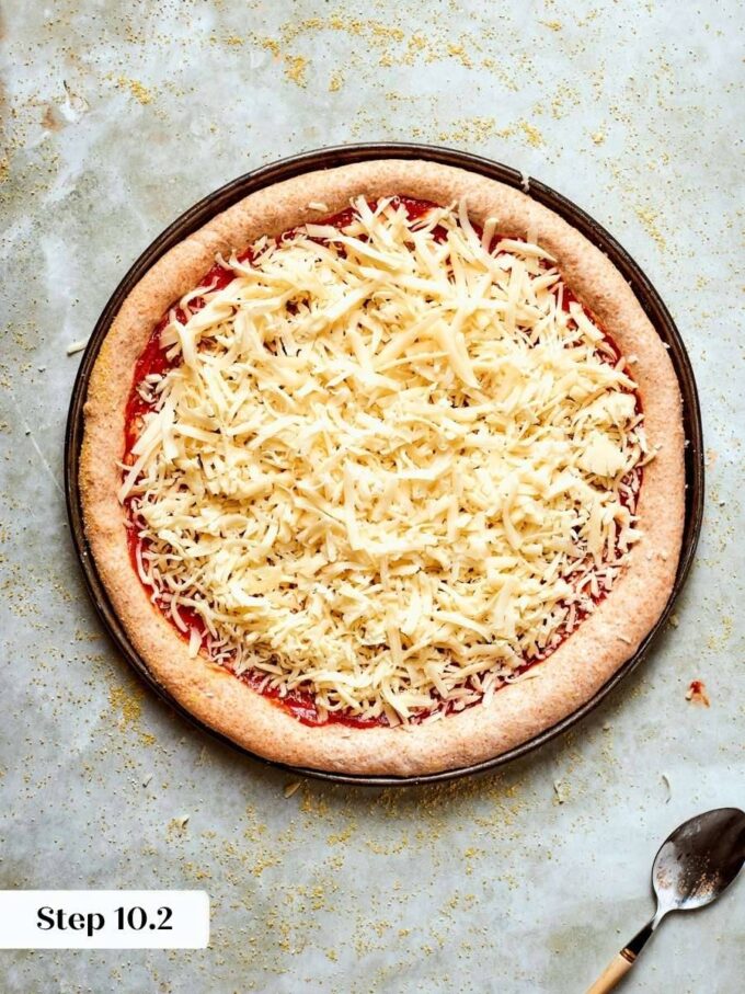 An even sauce layer keeps the whole wheat pizza dough sturdy enough for generous toppings.