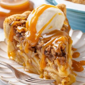 This tighter view highlights the tender crumb and apple layers inside every caramel apple pie slice.
