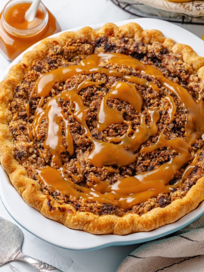 Glossy caramel over a craggy streusel makes this Dutch caramel apple pie a fall table centerpiece.