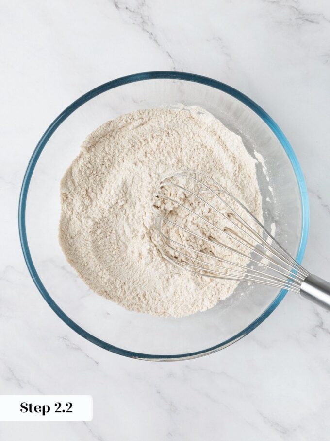 Evenly combined dry ingredients ensure the chocolate chip pumpkin bread rises consistently across the whole loaf.