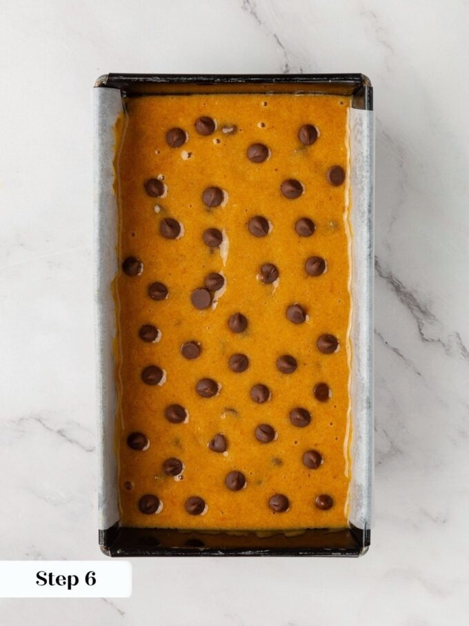Chips scattered on top bake into the studded crust that defines this chocolate chip pumpkin bread.