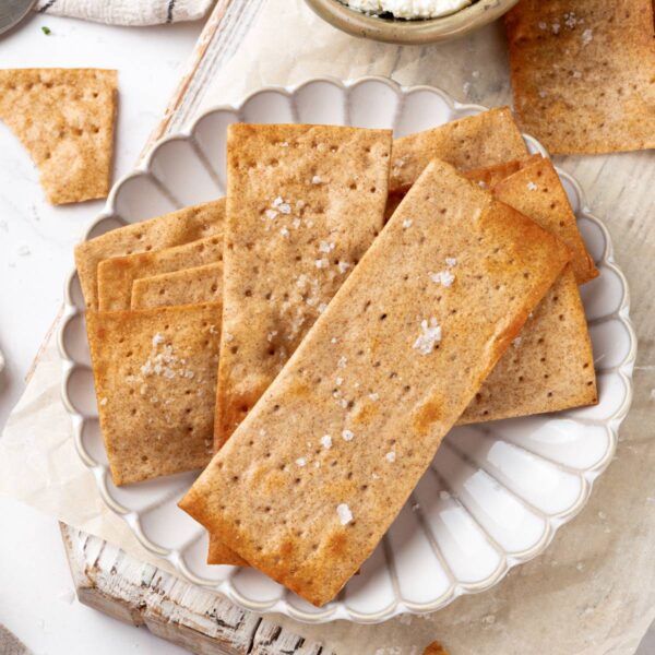 Plated simply, knackebrod needs no garnish beyond the flaky salt already baked onto its surface.