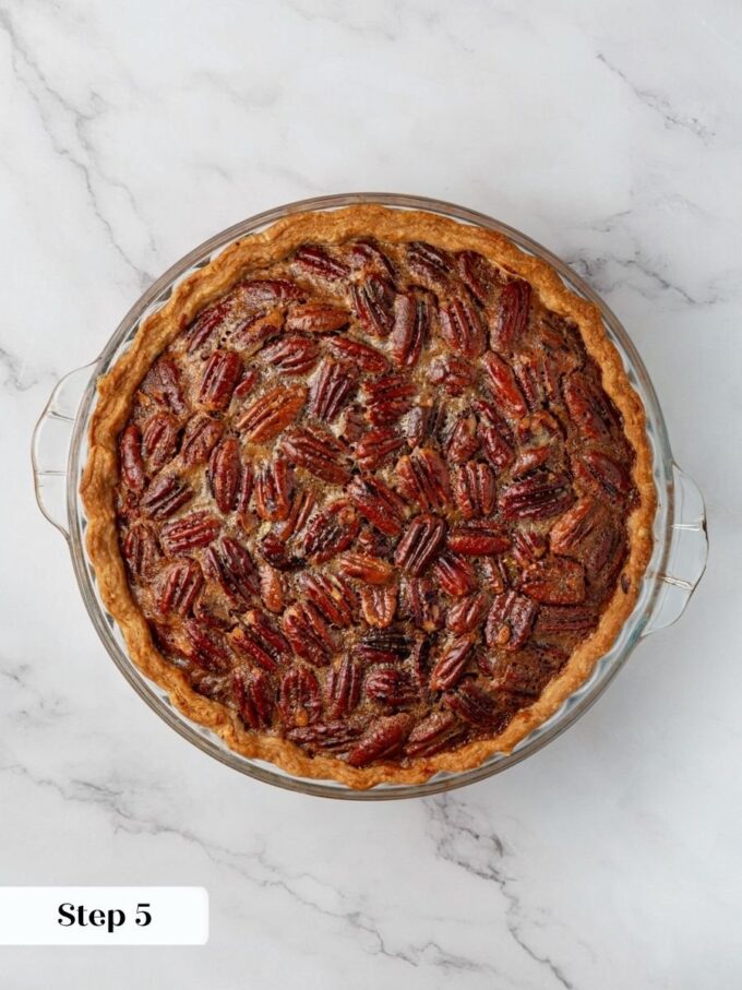 Baked nearly an hour, the pumpkin pecan pie sets firm with only a slight center jiggle.