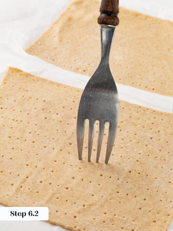 Docking lets steam escape so sourdough crispbread bakes flat instead of puffing into blisters.