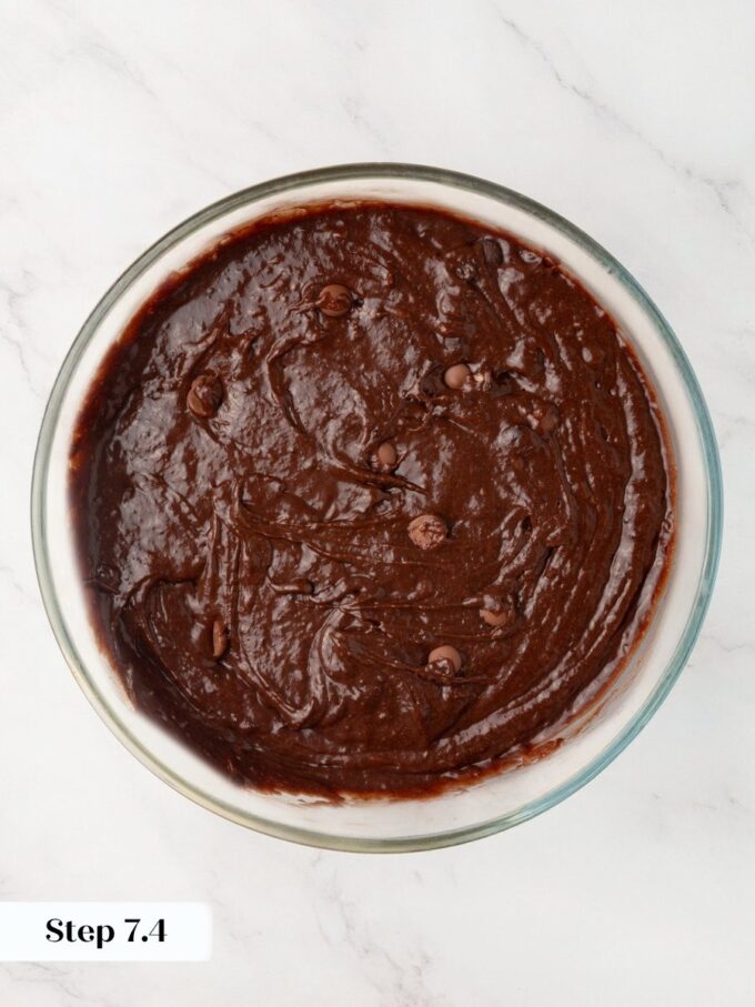 Just a few strokes distribute the chips without deflating the sourdough discard brownies batter you built.