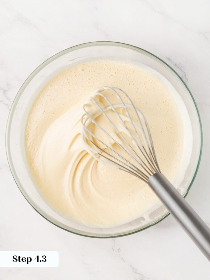 Three to five minutes of whisking is what gives sourdough discard brownies their shiny crackly crust.