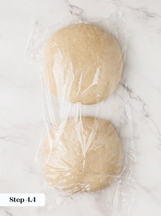 A brief covered rest relaxes the gluten so sourdough rye bread shapes without fighting back.