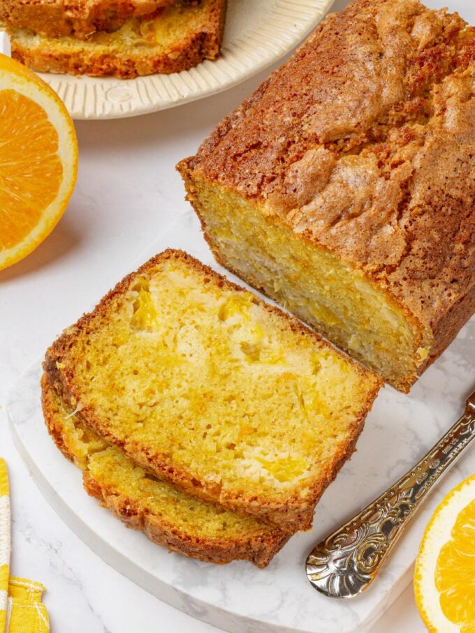 Cut fresh and served plain, orange bread proves it never needed a glaze to satisfy.