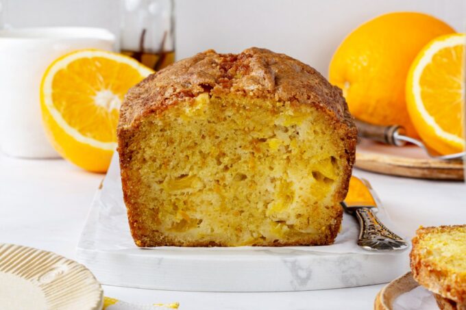 Slice into it and the segments are still whole, which is the point of orange bread.