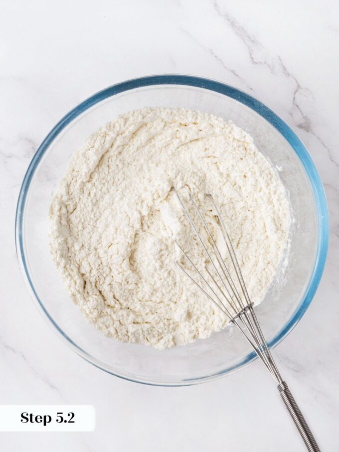 Thirty seconds of whisking here saves you from streaks of raw leavener in orange bread.