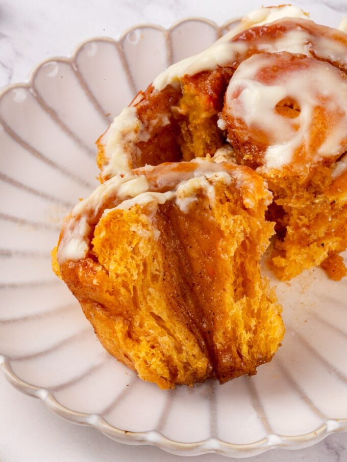 A full cup of puree gives sweet potato cinnamon rolls this soft, deeply coloured crumb.