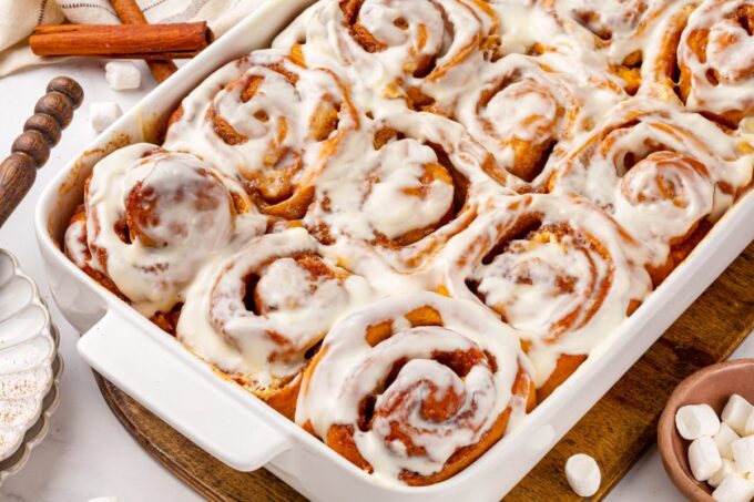 Set out on a board, sweet potato cinnamon rolls make an easy autumn breakfast for twelve.
