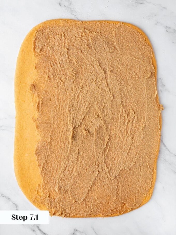 That bare half inch strip is what seals sweet potato cinnamon rolls shut after rolling.