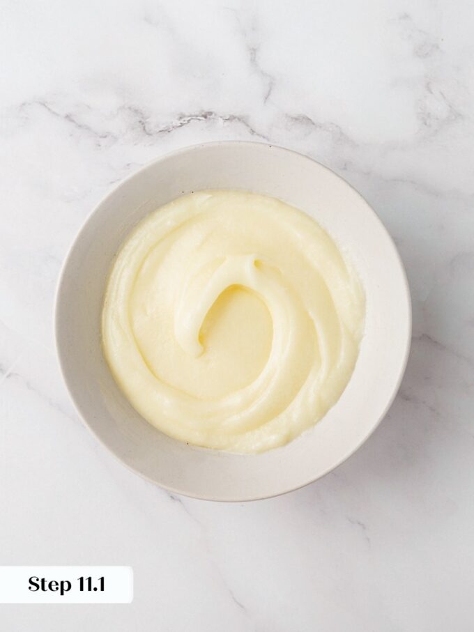 A splash of milk loosens this frosting so it spreads over sweet potato cinnamon rolls easily.