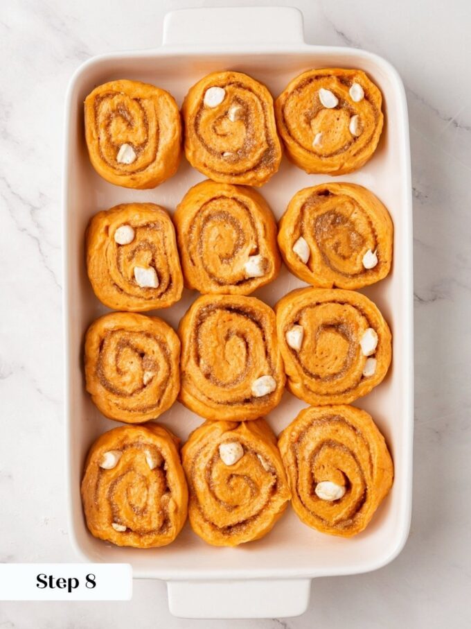 Three across and four deep, a snug pan gives sweet potato cinnamon rolls extra height.