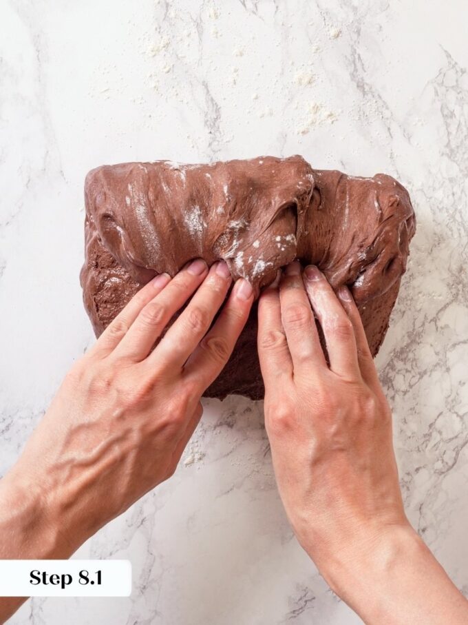 Cupping and rounding the dough builds the surface tension behind chocolate sourdough bread's dramatic oven spring.