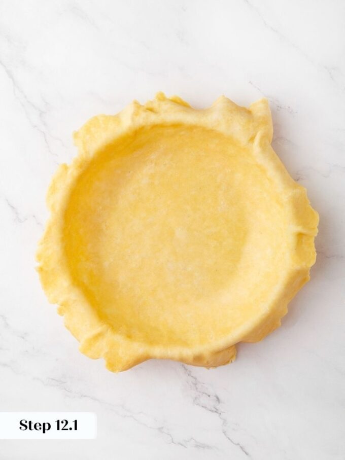 Extra dough over the rim lets the homemade apple pie edge roll under later.