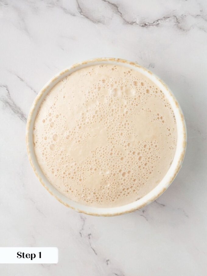 Proofing the yeast first confirms it is active before building this hearty Russian black bread dough.