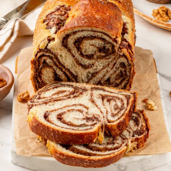This Eastern European povitica bread pairs a tender enriched dough with a rich walnut swirl.