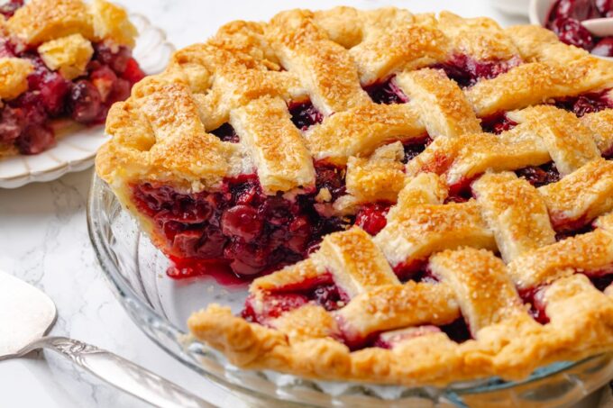 Serve sour cherry pie fully cooled so the filling holds its shape as you slice.