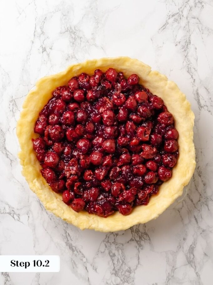 Thick, fully cooled filling goes in cold so the sour cherry pie holds its shape.