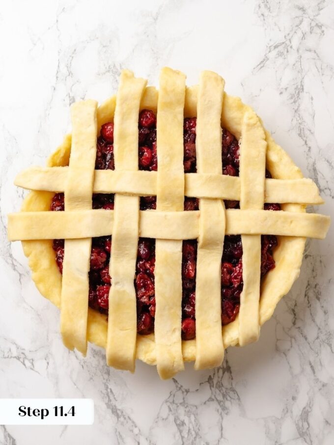 Alternating which strips fold back keeps the over-under weave of the sour cherry pie lattice consistent.