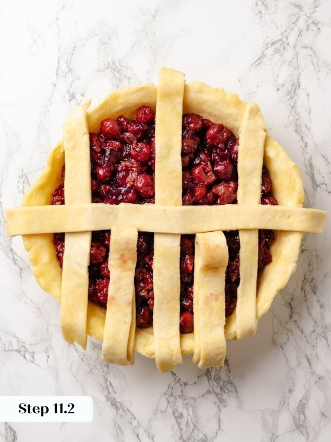 Folding back alternate strips before each cross piece creates the woven sour cherry pie top.